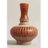 A TURKISH TERRACOTTA POT 9.5ins high.