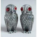 A PAIR OF .800 OWL SALT AND PEPPERS