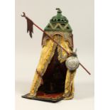 A VIENNA PAINTED COLD CAST TENT with figure. 13ins high.