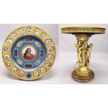 A SUPERB 19TH CENTURY SEVRES AND ORMOLU GEURIDON, thecircular top inset with a painted porcelain