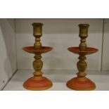 A pair of heavy patinated brass candlesticks.