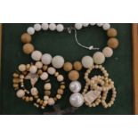 Various bead necklaces.