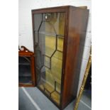 A mahogany display cabinet.