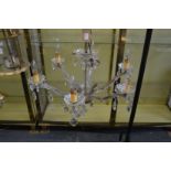 A Venetian style glass six branch chandelier.