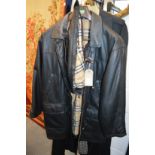 A Burberry leather threequarter length coat with matching hood.