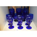 Blue glass drinking glasses and goblets.