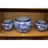 A Wedgwood Swallow pattern blue and white jardiniere and a pair of matching smaller jardinieres.