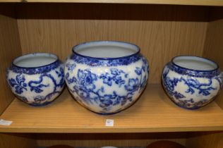 A Wedgwood Swallow pattern blue and white jardiniere and a pair of matching smaller jardinieres.