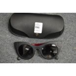 A pair of Carrera sunglasses, cased.