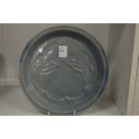 A Chinese circular moulded dish.