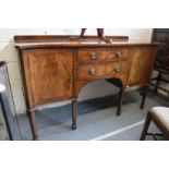 A Georgian style mahogany serpentine fronted sideboard.