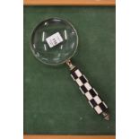 A magnifying glass.