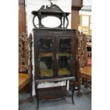 A Victorian mahogany music cabinet.