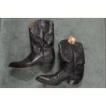 A pair of gentlemen's black leather cowboy boots, size 12.
