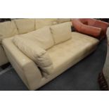 A Roche Bobois cream leather chaise longue.