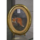 A small oval picture of a fox.