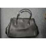 A ladies' black leather handbag.