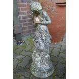A composite garden ornament modelled as a classical young lady.
