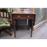 A 19th century mahogany drop flap occasional table.