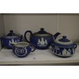 A Wedgwood blue Jasper ware Royal Commemorative three piece tea service and a similar bowl and