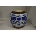 A Chinese blue and white dragon jar.