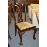 A set of four Georgian style mahogany dining chairs.