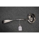 An Edinburgh silver ladle.