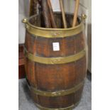 A brass bound oak bucket.
