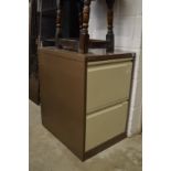 A metal two drawer filing cabinet.