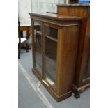 A mahogany two door bookcase.