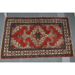 A small Persian rug.