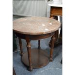 A marble and mahogany two tier circular table (marble cracked).