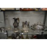 A silver collared cut glass decanter, plated items to include a biscuit box and cover, entree dish