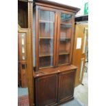 A Victorian mahogany cupboard bookcase.