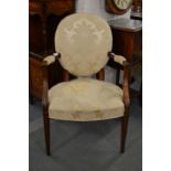 A Hepplewhite style upholstered mahogany framed armchair.