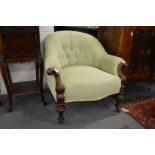 A good Victorian mahogany framed button upholstered armchair.