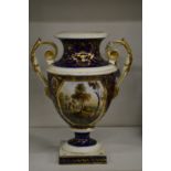 A 19th century Crown Derby urn shaped twin handled pedestal vase, rich blue ground with gilt