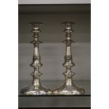 A pair of plated candlesticks.