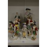 A group of porcelain figures.