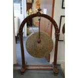 A good Victorian carved oak framed dinner gong.