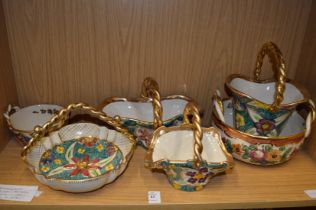 A quantity of colourful 1950's Belgian pottery baskets.