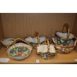 A quantity of colourful 1950's Belgian pottery baskets.