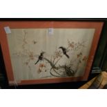 A Chinese silk embroidered picture of birds on a branch.
