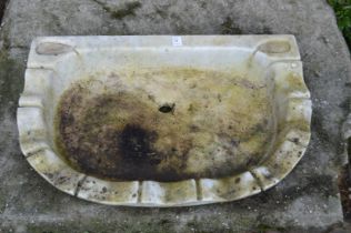 A carved marble basin.