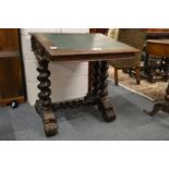 A Victorian carved oak desk.