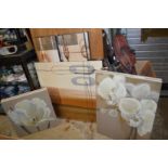 A quantity of decorative modern canvas paintings.