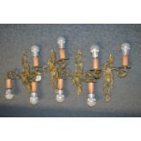 A good set of four heavy brass twin branch wall lights.