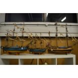 Two well-made models of the sailing ship 'The Bounty' together with a similar model of 'The