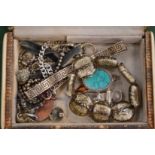 A jewellery box containing jewellery.