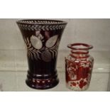 A ruby tinted cut glass vase and similar jar.